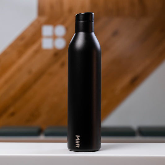 reusable insulated water bottle in black by MIIR